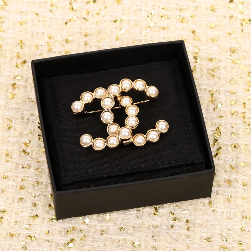 Ch**el brooches